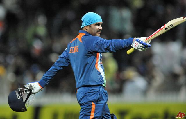 virender sehwag double century, virender sehwag breaks world record, sehwag scores 219 indore odi, world odi score record virender sehwag, india vs west indies one day match, indore one day cricket match 