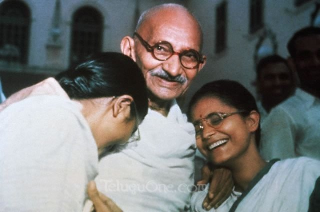 mahatmagandhilaughingwithgranddaughters.jpg