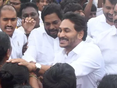 jagan hand on peoples heads