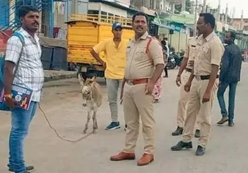 Candidate arrives on donkey to for banswada poll