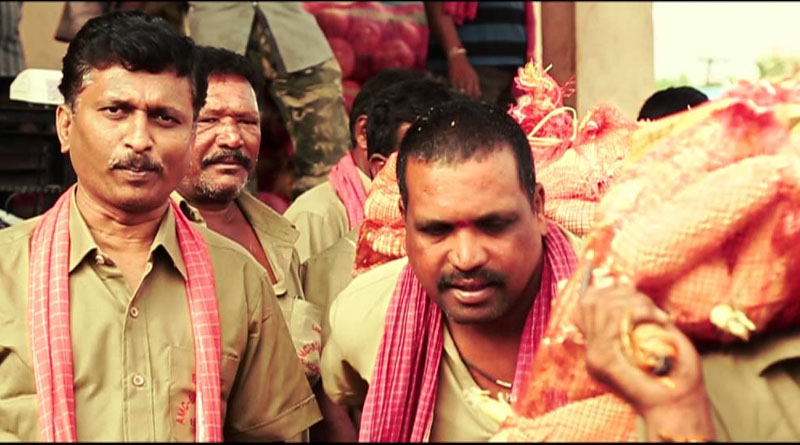 Hamali workers stage sit-in to protest government move in Nalgonda