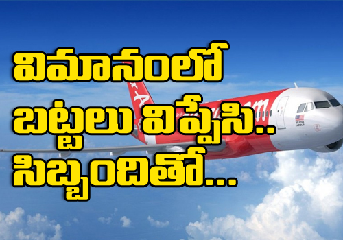 a passenger remove his dress in the air asia flight