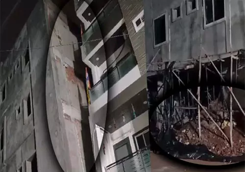 A five-storied building leaning to the side.. Hydra ready to be demolished