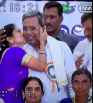 Woman kisses Karnataka CM 
