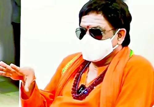 yalamanchili ycp mla kannababu raju visit villages in swamiji getup 