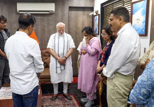 modi goes to former cm vijayrupanis house