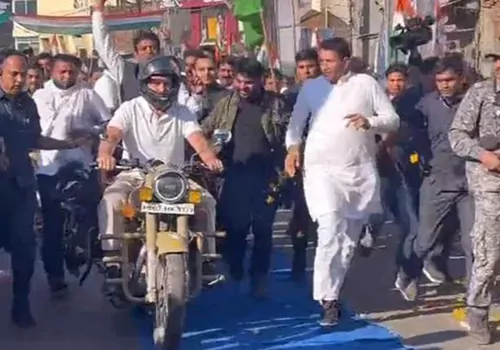 rahul rides bike in joda yatra