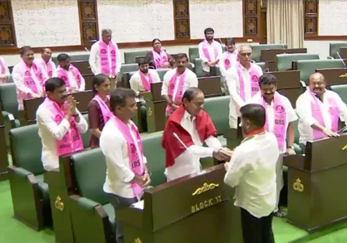 telangana cm revanth shake hand with kcr