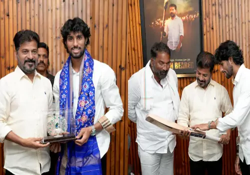telangana cm revanth fecilitate crickter tilak verma