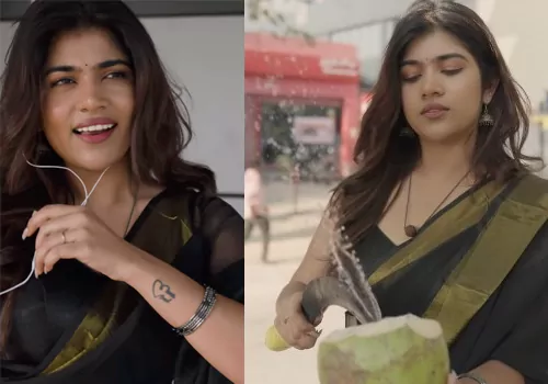 లేడీ విత్ బ్లాక్ క్యూట్ గా కొబ్బరిబోండాలు కొట్టడం చూస్తుంటే ...