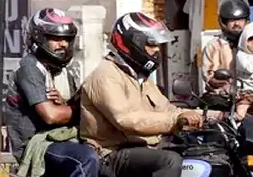 two helmets with two wheelers