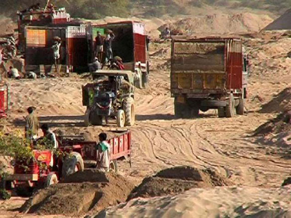 Sand mafia, transport, mining, business, artificial scarsity, robbery, straight robbery, syndicate